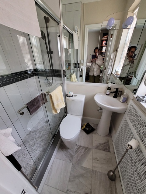 Updated shower to support wheelchair bound person